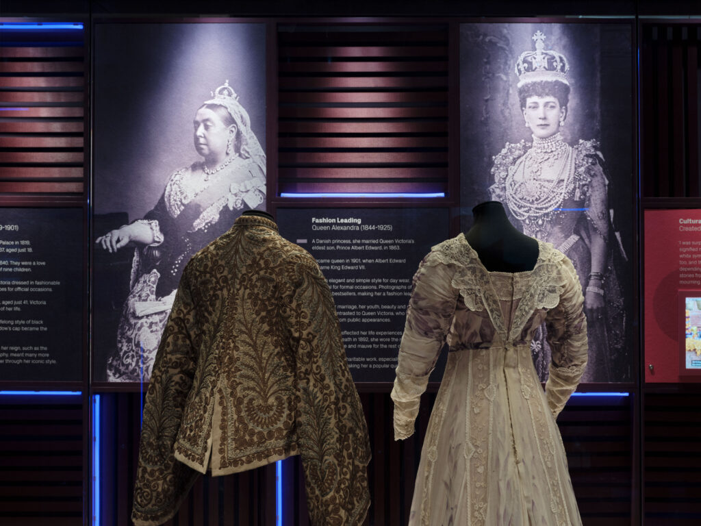 Textile conservation lighting by Michael Grubb Studio showcasing fashion and identity in a heritage exhibition "Dress Codes" at Kensington Palace