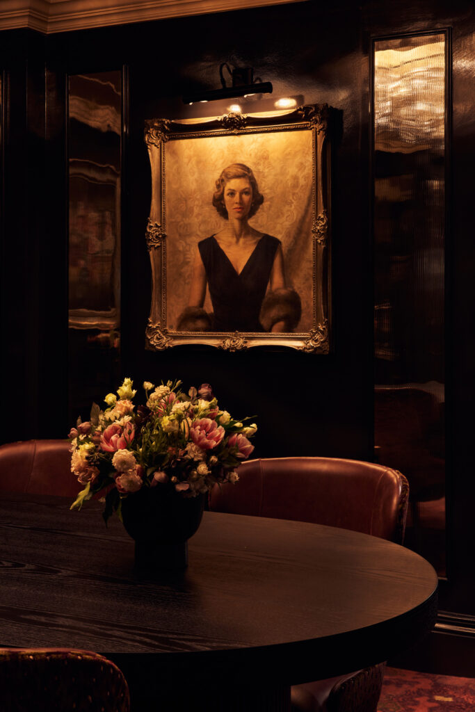Commercial lighting design for a historic private members’ club in London, showcasing layered illumination for premium hospitality environments.
