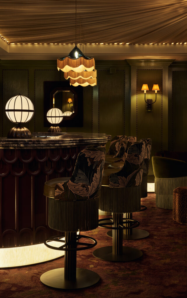 Speakeasy bar lighting with illuminated ceiling and accent layers, created for high-end hospitality and private club design in London.