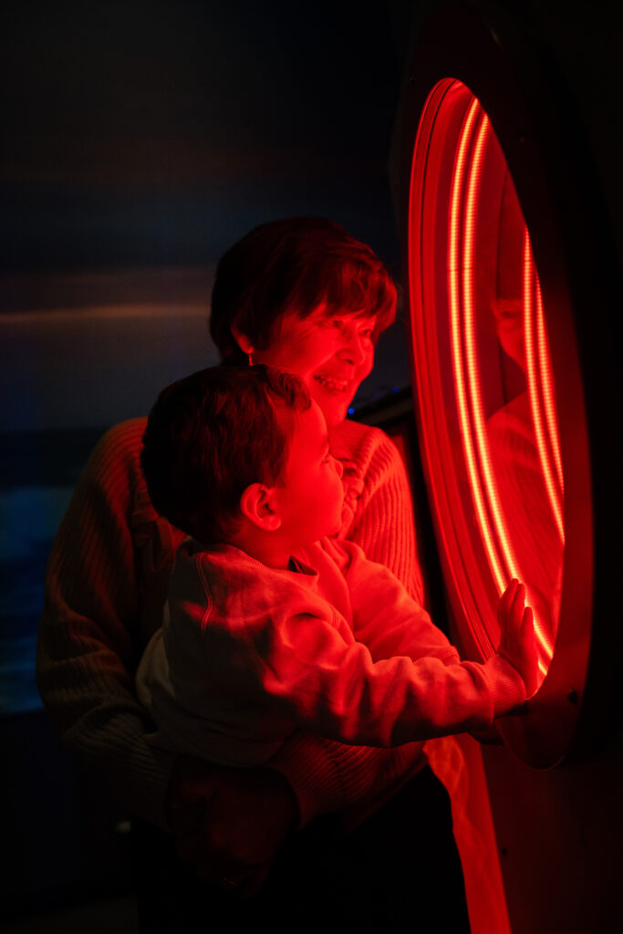 Interactive exhibition lighting design supporting hands-on learning through light, sound and water installations within a science centre.