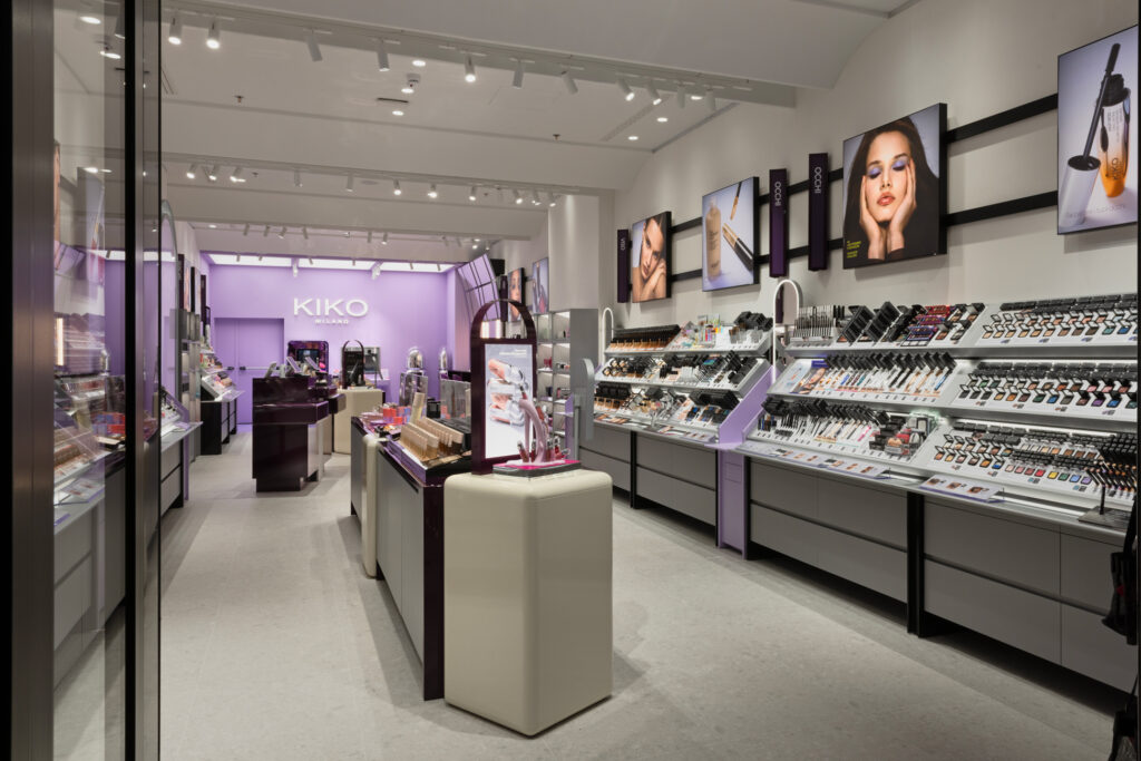 Retail interior lighting design inspired by Italian craftsmanship, enhancing product presentation and brand identity within a modern cosmetics store.